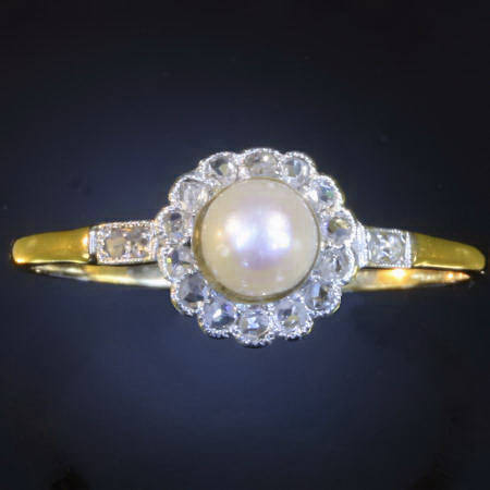 Elegant rose cut diamonds and pearl Victorian engagement ring platinum and
