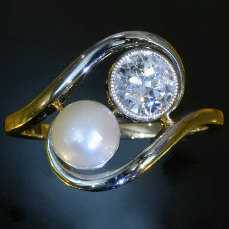 and romantic toi and moi Art Nouveau pearl and brilliant engagement ring