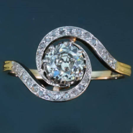 Tourbillon twirled victorian engagement ring with big cushion cut diamond 