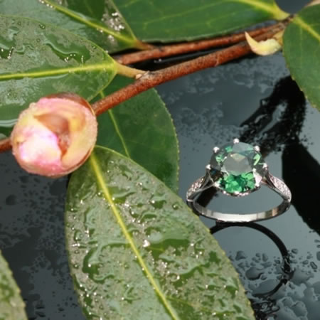 Green stone estate engagement ring platinum shank