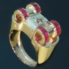 oude sieraden en antieke juwelen van Adin Antwerpen: Extreme decoratieve kunst Retro / Fifties gouden armband bezet met diamanten en saffieren
