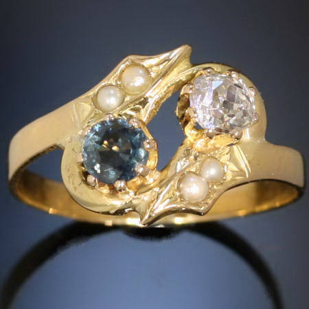Decorative ring with diamond and sapphire