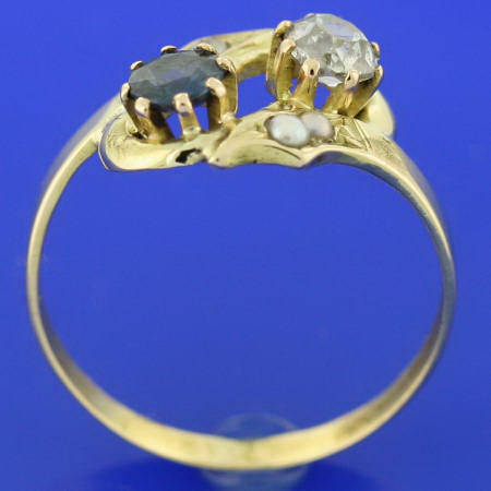 Decorative ring with diamond and sapphire