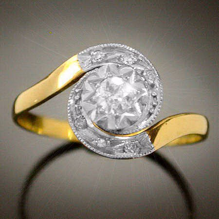 18K GOLD/PLATINUM DIAMONDS TOURBILLON RING, Images by Adin Antique Jewelry.