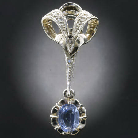 Expressive sapphire and diamond pendant