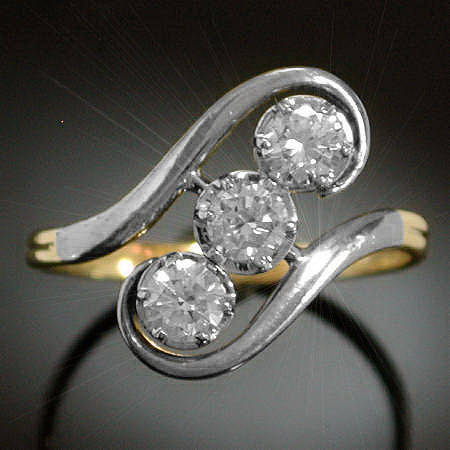 Elegant estate three stone diamond ring