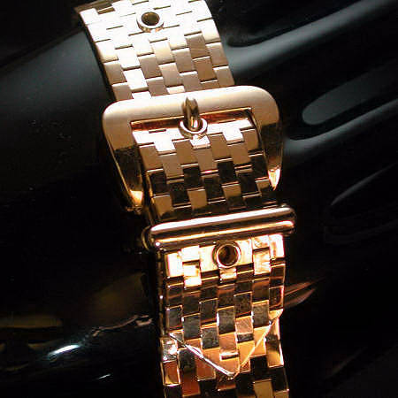 Golden belt buckle bracelet from the fifties