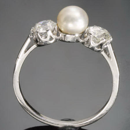 Platinum brilliants and pearl engagement ring