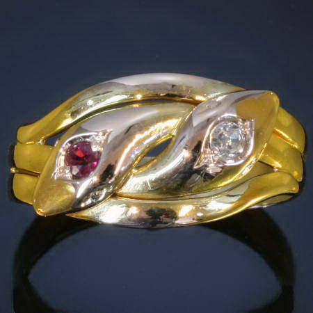 Victorian golden double serpent ring with diamond and ruby