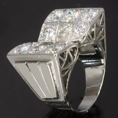 Solid platinum Retro ring with high quality brilliant cut diamonds