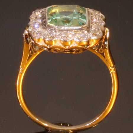 Late Victorian old mine cut diamonds with central beryl engagement ring