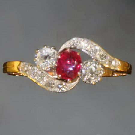 Sparkling old mine cut diamonds and ruby Victorian engagement  ring