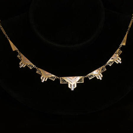 Strong design tri-color golden Art Deco filigree bow chain