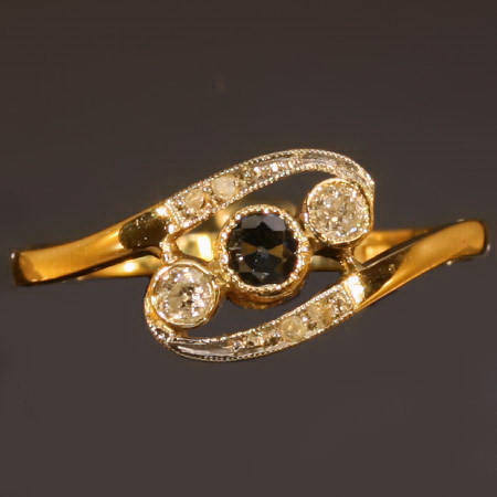 Elegant late Victorian ring with diamonds and sapphires