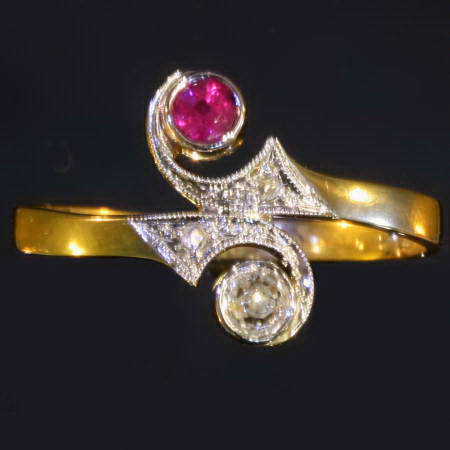 Two-tone gold late Victorian toi and moi ring with old mine cut diamond and ruby