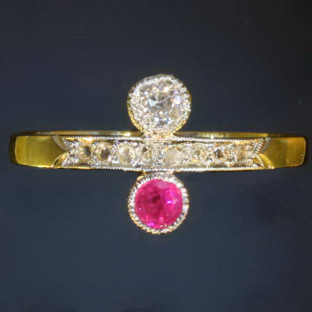 Ruby diamond crossover engagement ring yellow gold