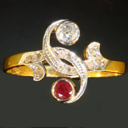Two tone gold late Victorian toi and moi ring with old mine cut diamond and ruby