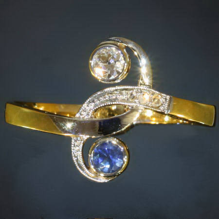 Late Victorian two tone golden diamonds and sapphire toi and moi ring