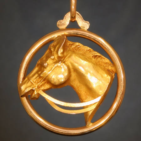 18K two-tone gold late Victorian pendant with horse head