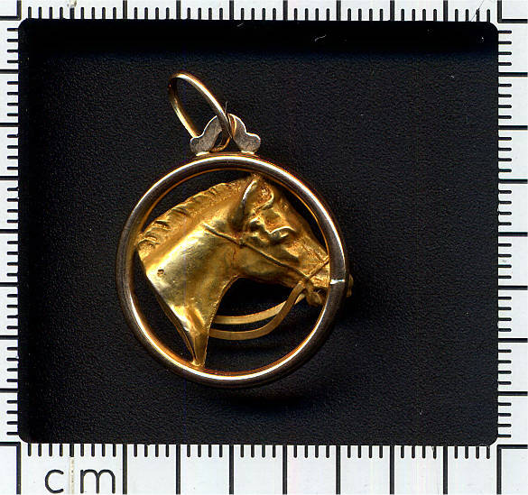 18K two-tone gold late Victorian pendant with horse head