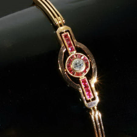 Art deco bracelet with square cut rubies and an old mine brilliant cut diamond