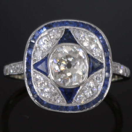 Original Art Deco platinum engagement ring with cushion cut diamond and sapphires