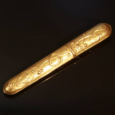 Golden Art Nouveau needle holder with mistletoe motives made in France