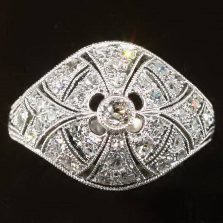 Platinum estate ring with diamonds, dome shaped