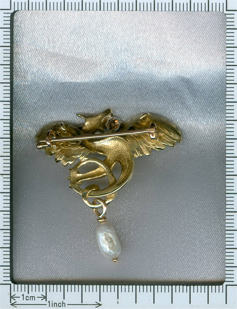 French late Victorian early Art Nouveau expressive golden griffin brooch pendant
