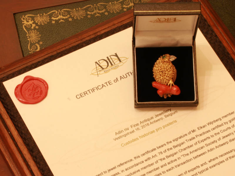 Fifties golden bird with demantoid eye and diamond beak on coral branch (image 6 of 6)