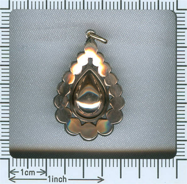 Victorian pear shape rose cut diamond in gold backed silver pendant