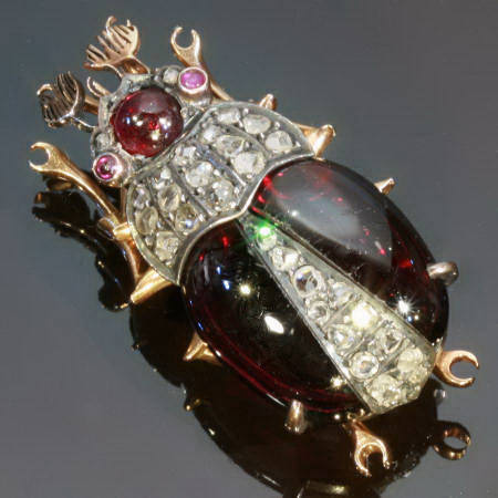 Victorian bejeweled beetle brooch with rose cut diamonds and garnets