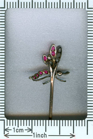 Victorian golden stickpin in the form of a diamond and ruby mosquito