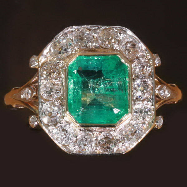 Estate diamond and Columbian emerald engagement ring