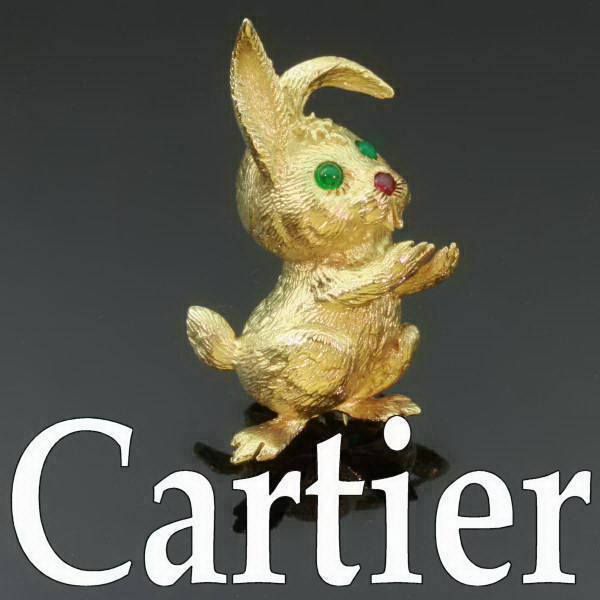 Cute little golden bunny with emeralds and ruby signed Cartier