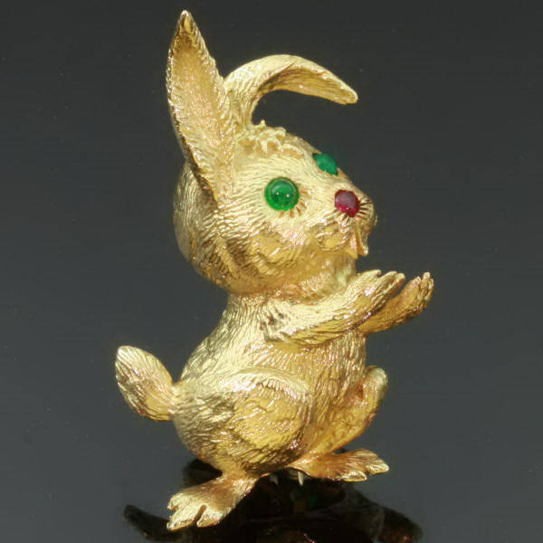 Cute little golden bunny with emeralds and ruby signed Cartier