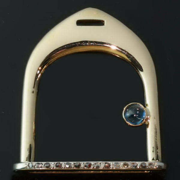 Estate gold stirrup brooch with rose cut diamonds and cabochon sapphire