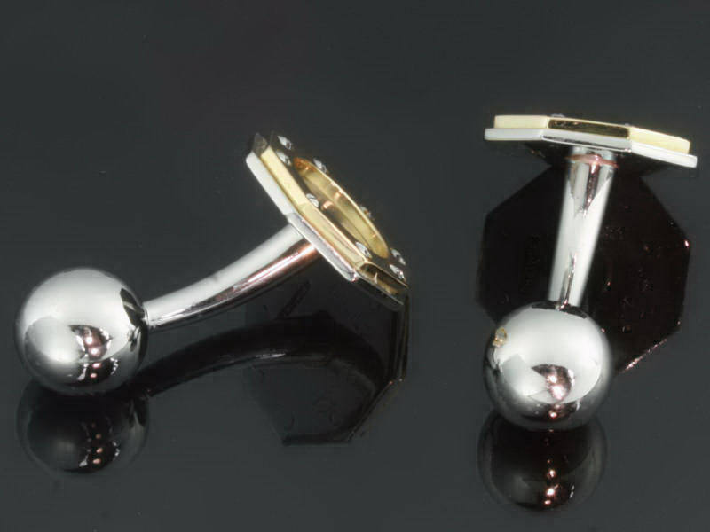 Estate Cartier cufflinks steel and gold Images by Adin Antique