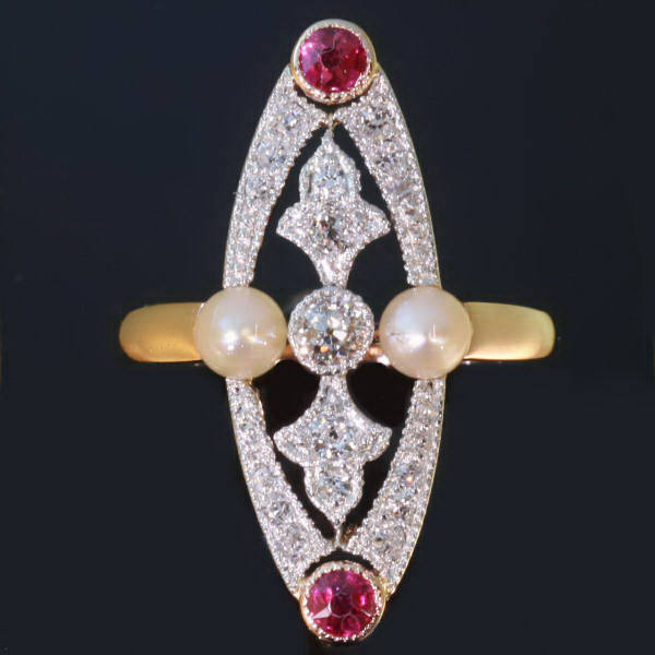 Elegant Victorian engagement ring with diamonds, rubies and pearls