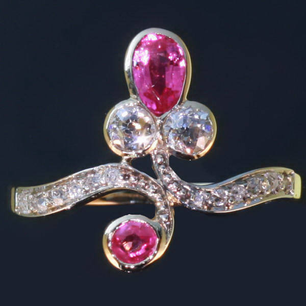 Tasteful Victorian engagement ring with old mine cut diamonds and rubies