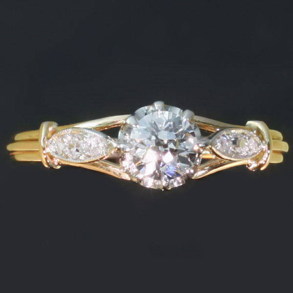 Estate engagement ring with old mine brilliant cut diamond