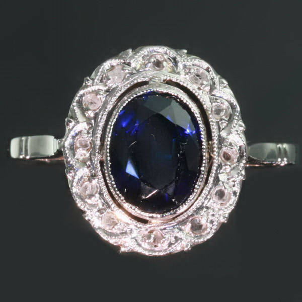 French estate engagement ring with diamonds and sapphire
