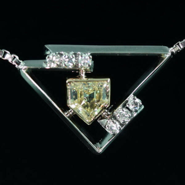 Gold pendant, typically modern Seventies design with fancy cut and color diamond