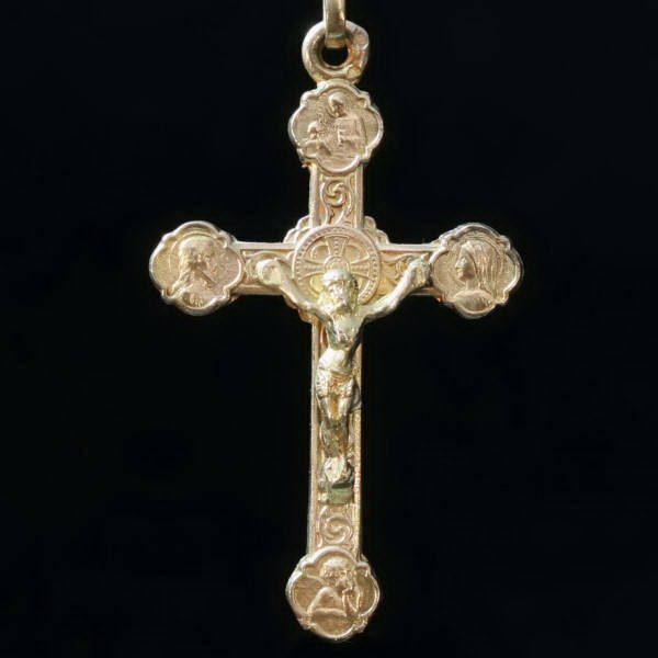 Gold Victorian crucifix filled with symbolism and made in France