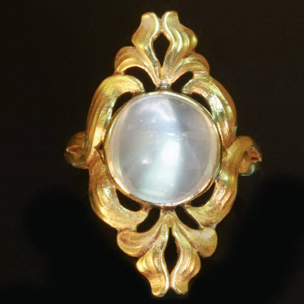 Dreamy Art Nouveau ring with high domed cabochon moonstone