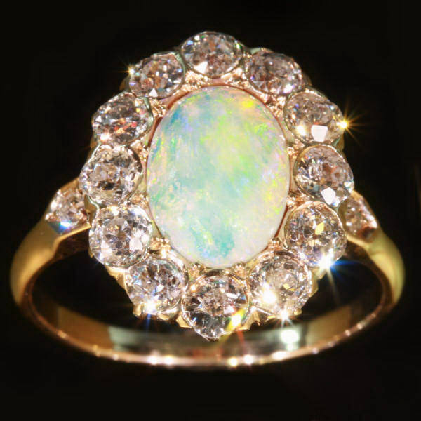 Victorian engagement ring with brilliant cut diamonds and opal