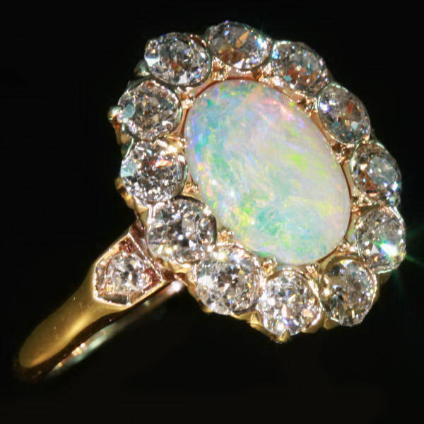 Victorian engagement ring with brilliant cut diamonds and opal ...
