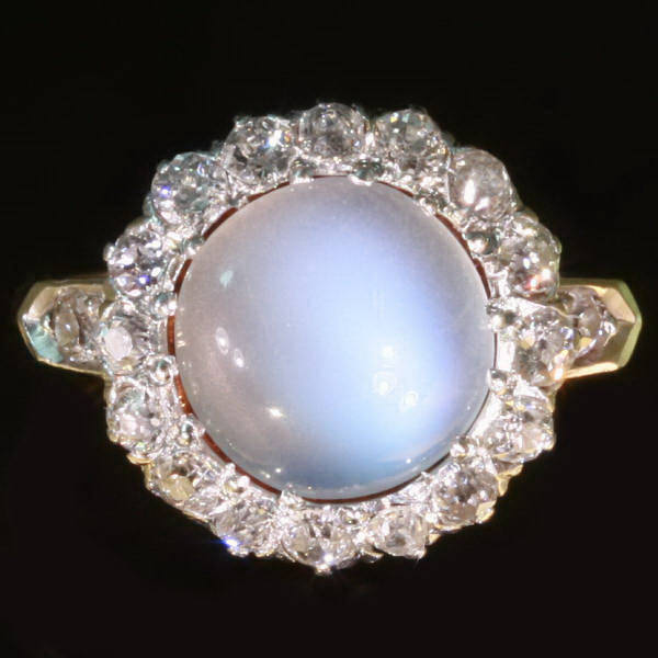 Charming late Victorian engagement ring with moonstone and old mine cut diamonds