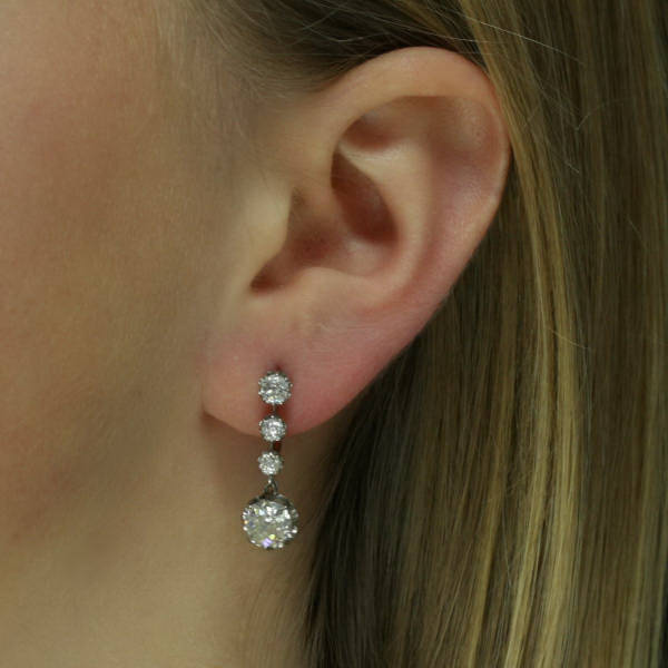 Beautiful long pendent inline diamond earrings (total diamond weight 2. ...