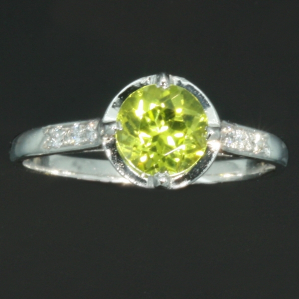 Sparkling peridot and diamond platinum Art Deco engagement ring